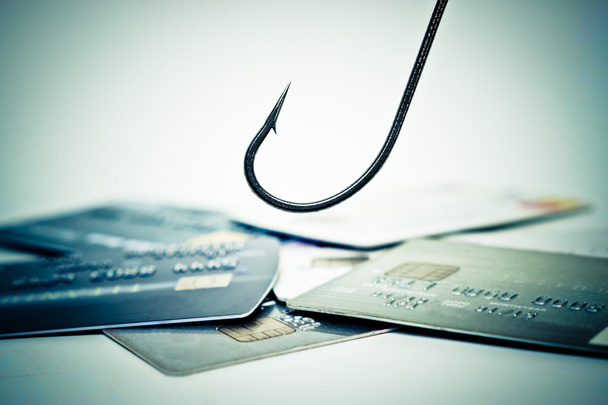 gancho de pescado sobre una pila de tarjetas de crédito
 - Foto, Imagen