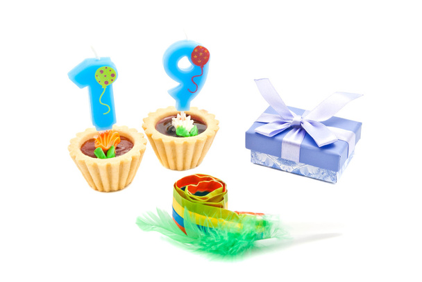 cakes with nineteen years birthday candles, whistle and gift - Фото, зображення