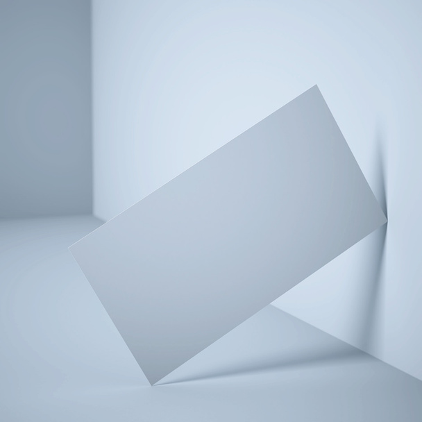 White blank business card near wall - Foto, Imagen