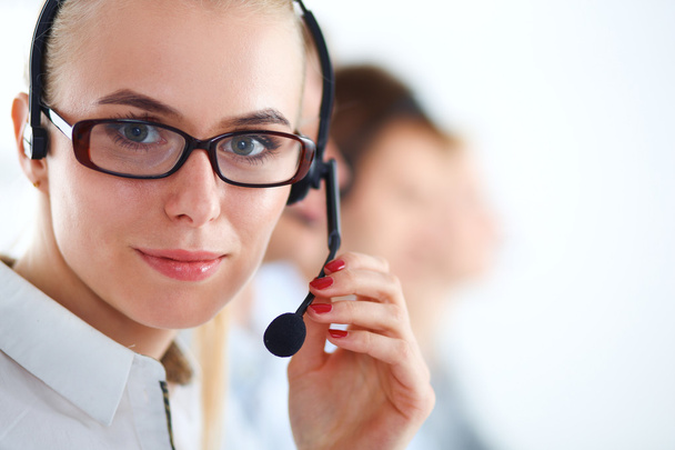 Attractive positive young businesspeople and colleagues in a call center office - Photo, Image
