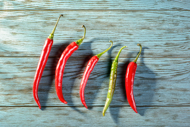 Chile peppers on table - Foto, Bild
