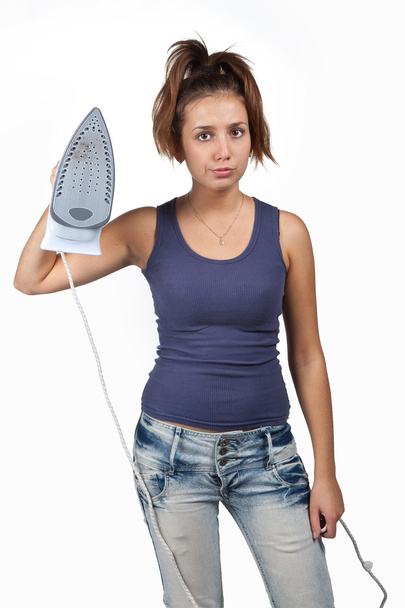 Young brunette girl with iron - Foto, Bild