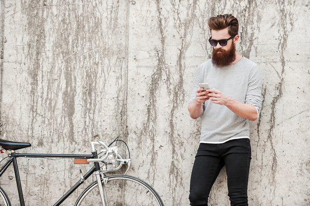 handsome bearded man with bicycle - 写真・画像