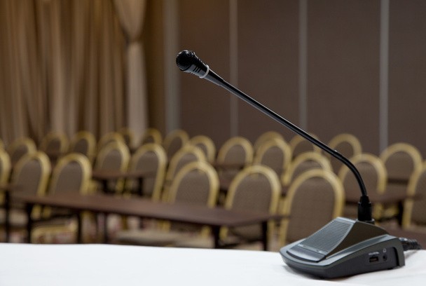 Black microphone in concert hall or conference room photo - Photo, Image