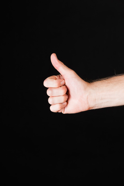 Male hand showing thumbs up  - Photo, Image