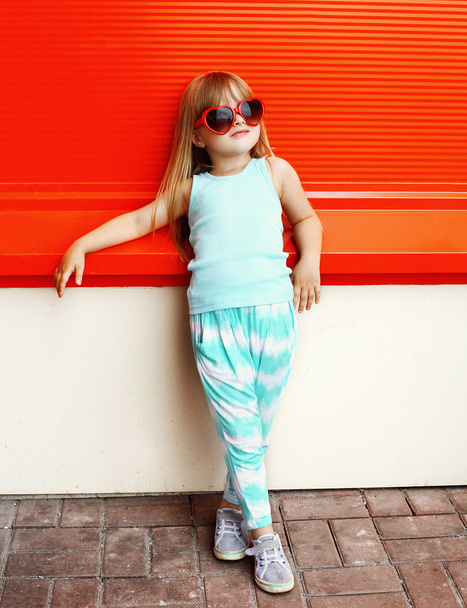 Fashion kid concept - stylish little girl child wearing a t-shir - 写真・画像