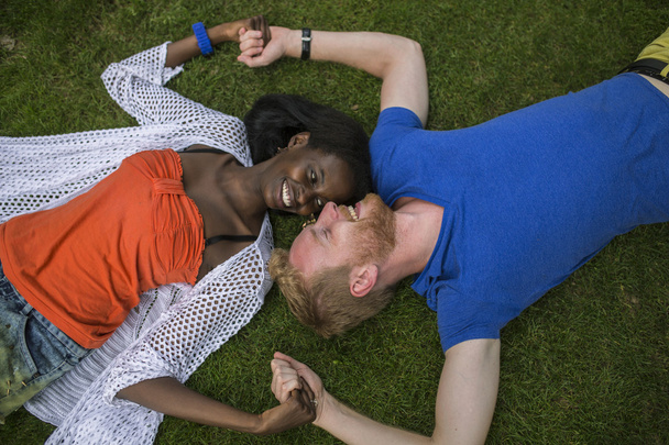 Multiracial couple in the park - Foto, Imagen