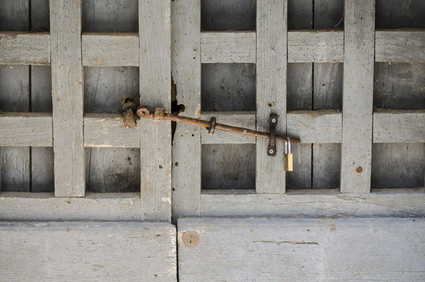 Detal Stare drzwi z zamkiem zamknięte - Zdjęcie, obraz