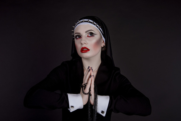 Halloween. Girl dressed in evil sexy nun - Foto, Imagem