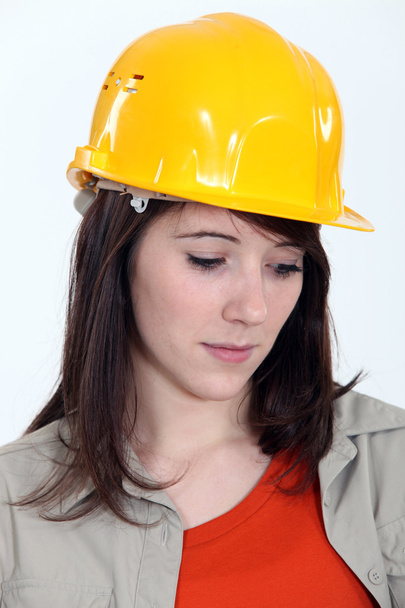 A sad female construction worker. - Foto, Imagen