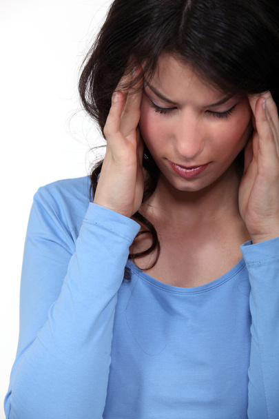 Woman with a headache - Foto, imagen