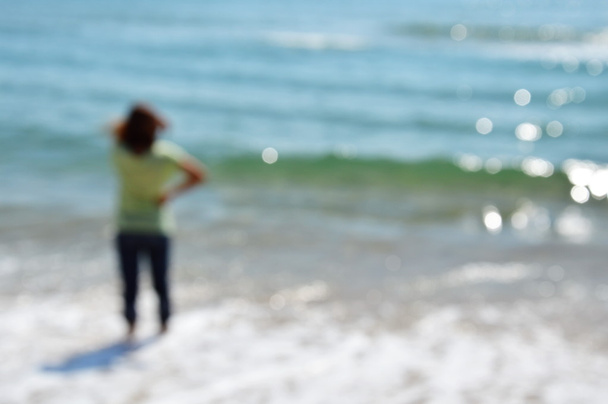 blurry woman on the beach - Foto, Imagen