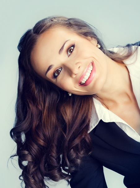 Portrait of happy smiling young businesswoman - Фото, зображення