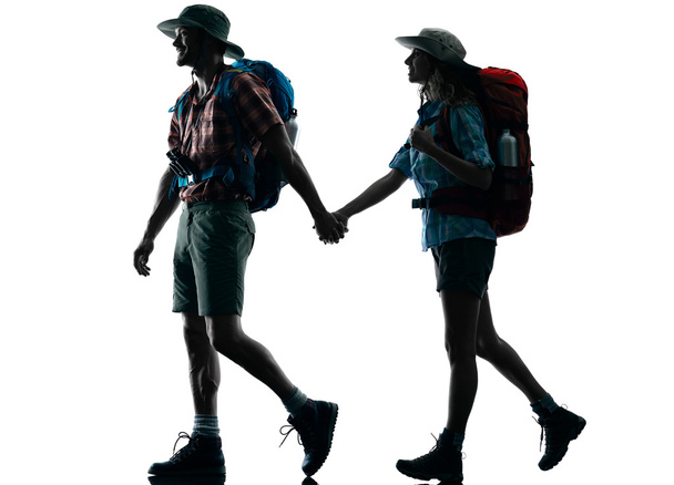 couple trekker trekking walking nature silhouette - Foto, afbeelding