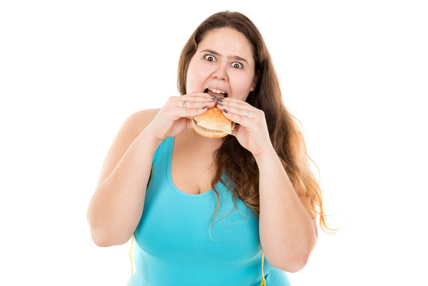 Χοντρό κορίτσι τρώει χάμπουργκερ - Φωτογραφία, εικόνα