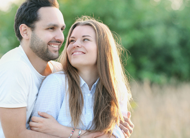 happy young couple outdoors in summer sunny day - Photo, Image