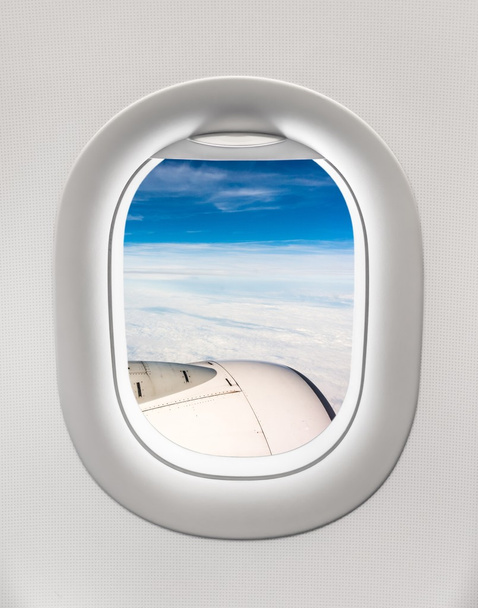 Вид из окна самолета на турбину самолета
 - Фото, изображение