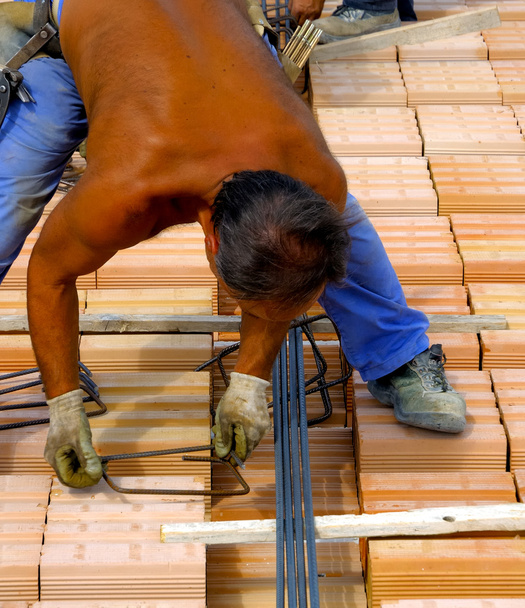 İşçi iş giysisi takviye metal çerçeve yapma - Fotoğraf, Görsel