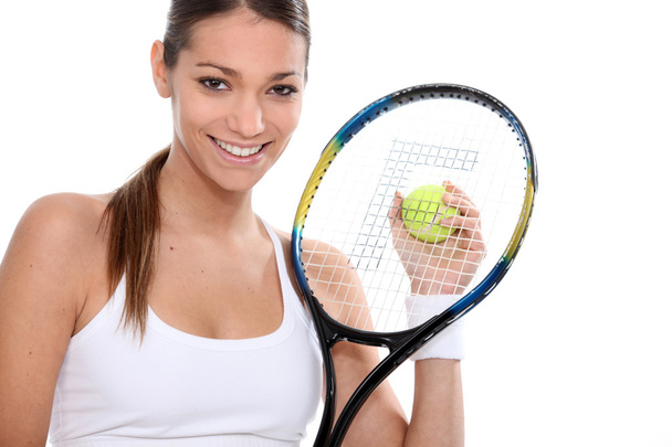 Woman playing tennis - 写真・画像
