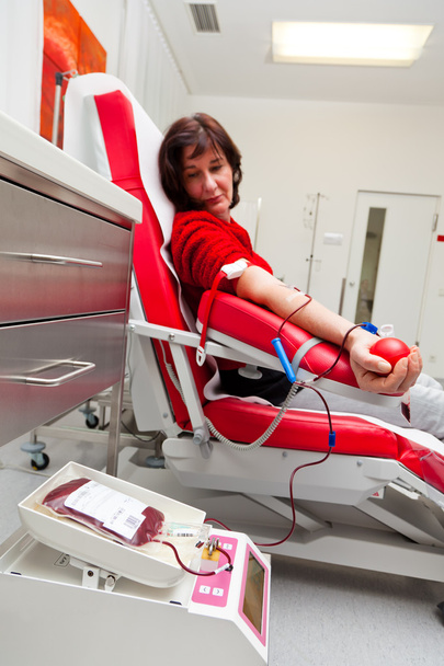 Woman in blood donations - Photo, image