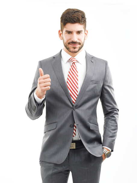 Businessman showing thumb up sign - Фото, изображение