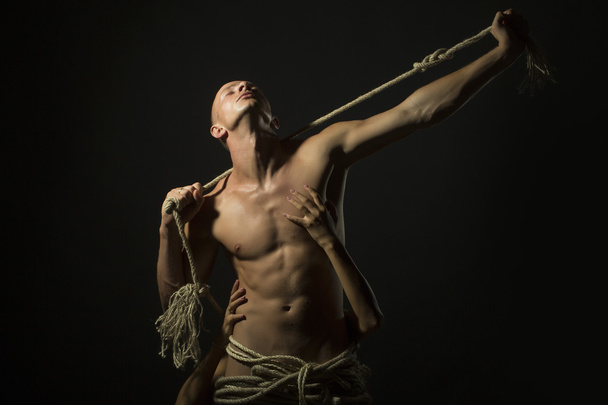 Male with rope and girl - Photo, image