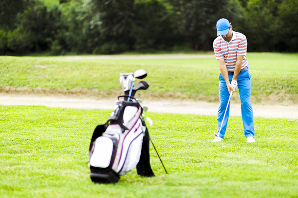 Golfer practicing before and after shot - Fotografie, Obrázek