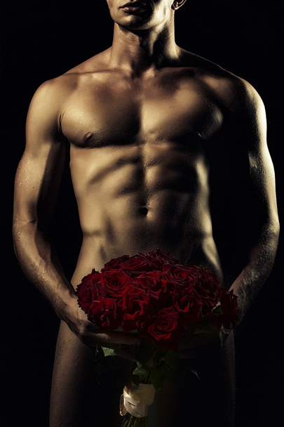 Man with rose bouquet - Foto, afbeelding