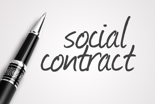 pen schrijft sociaal contract op papier - Foto, afbeelding