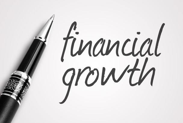 Stift schreibt Finanzwachstum auf Papier  - Foto, Bild