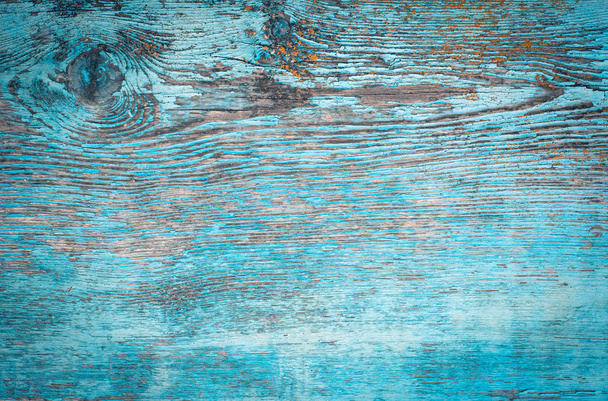 Old weathered plank painted in blue - 写真・画像