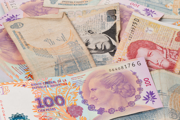 Nam Dolar i argentyńskie peso rachunki - Zdjęcie, obraz