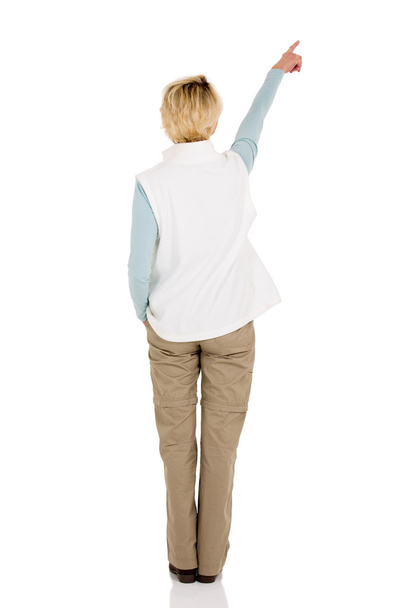 middle aged woman pointing by hand - Фото, зображення