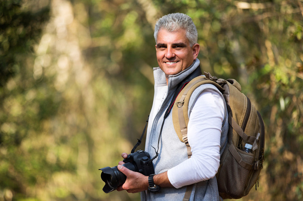 Man hiking with dslr camera - Foto, afbeelding