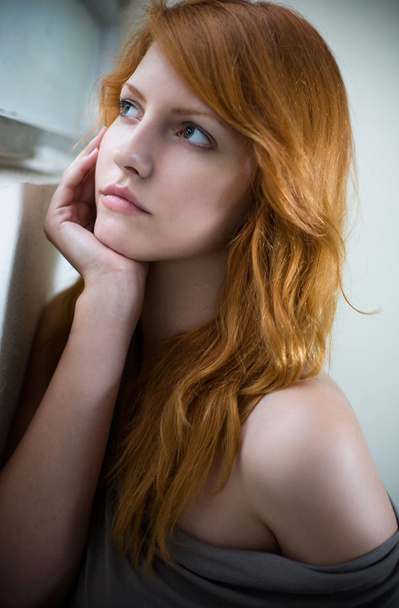 Romantic portrait of a beautiful redhead girl. - Фото, зображення