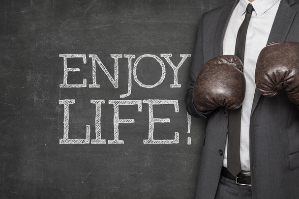 Enjoy life on blackboard with businessman on side - Фото, зображення