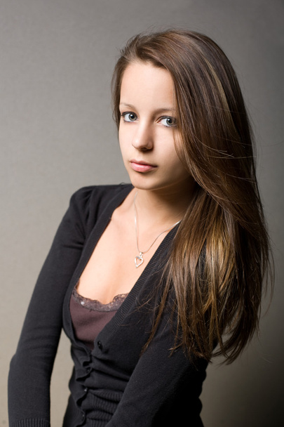 Contemplative young brunette girl. - Photo, Image