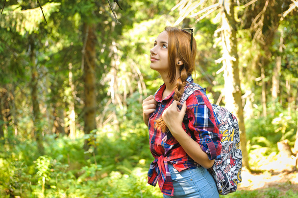 Young girl with backpack in mountain. - Photo, Image