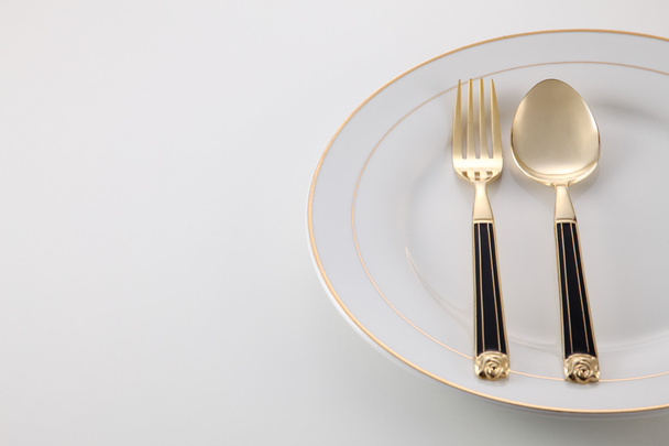 plate with fork and spoon - Fotoğraf, Görsel