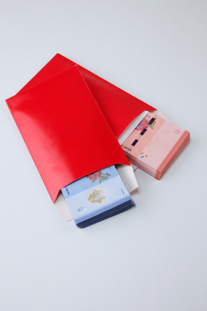 Red envelopes with money - 写真・画像