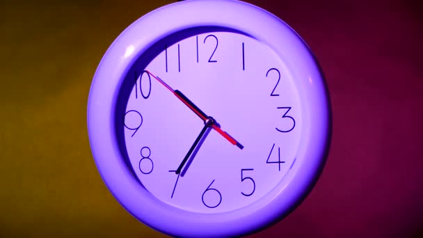 close up of an lilacclock on colorful background - Footage, Video