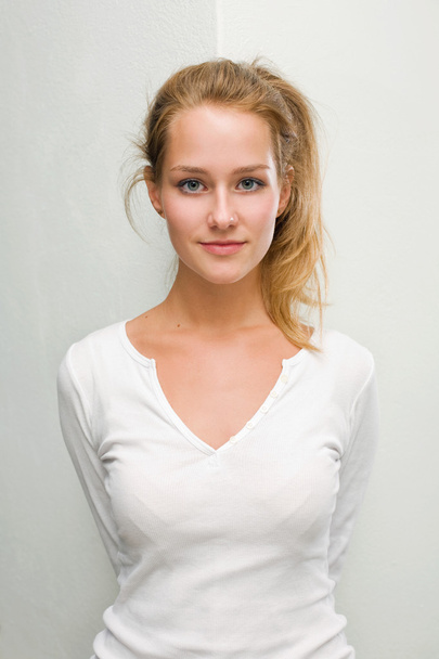 Portrait of confident young blond woman. - Fotó, kép