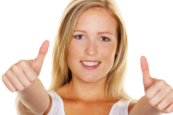 Woman holds up thumb - Foto, Imagen