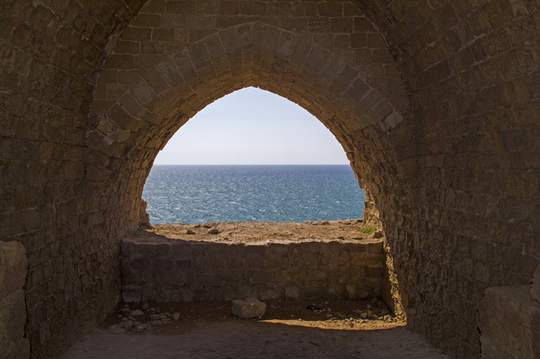 View to Mediterranean sea from the coast and Apollonia 's ruins
 - Фото, изображение
