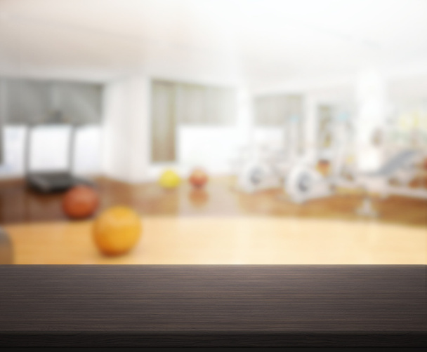 Tampo de mesa e Blur Fitness Ginásio do fundo
 - Foto, Imagem