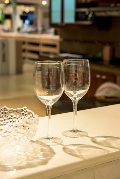 Simple home table setting, glasses in the kitchen interior. - Photo, Image