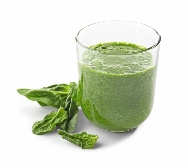 Glass of spinach juice isolated on white - 写真・画像