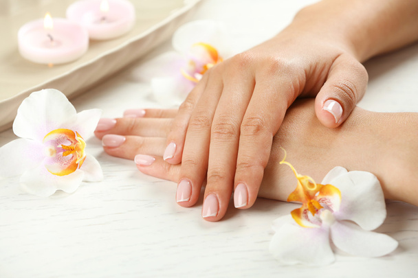 Woman hands with french manicure - Foto, Imagem