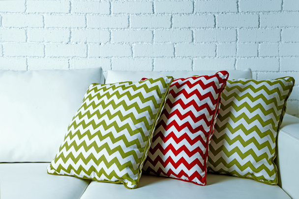 Colorful pillows on sofa - Fotografie, Obrázek