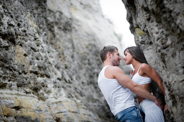 young lovers man and woman walking in the mountains - Foto, Imagem